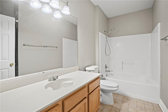 full bathroom with toilet, washtub / shower combination, and vanity