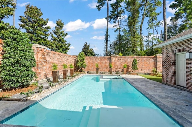 view of pool with a patio area