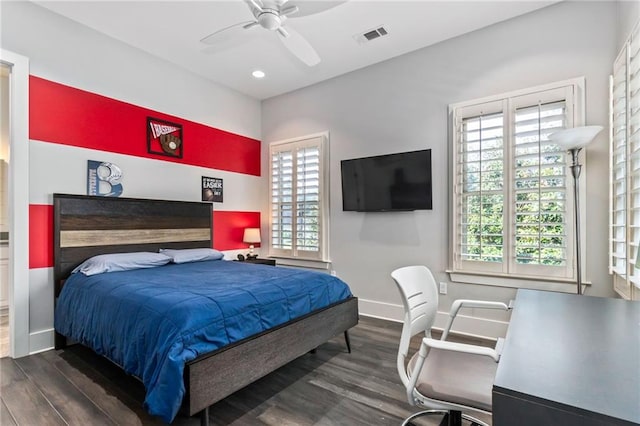 bedroom featuring dark wood-type flooring and ceiling fan