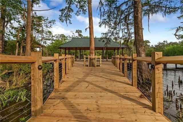 exterior space with a water view and a gazebo