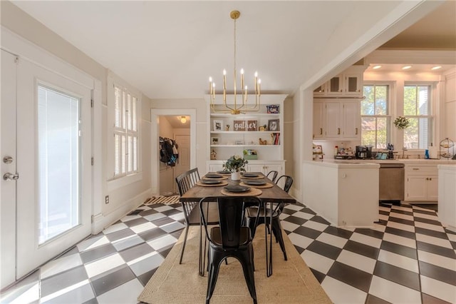 dining area with a notable chandelier