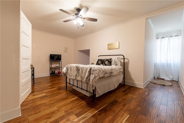 bedroom featuring ornamental molding, ceiling fan, and dark hardwood / wood-style floors