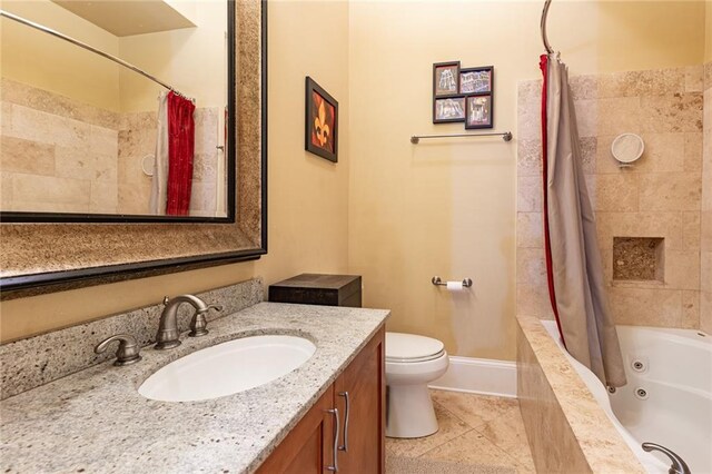 full bathroom with tile patterned floors, shower / bathtub combination with curtain, toilet, and vanity