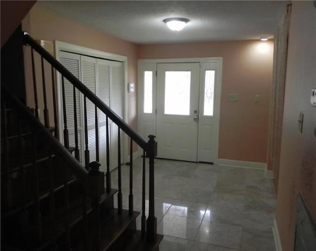 view of tiled foyer