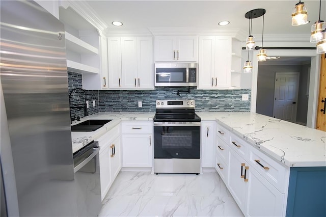 kitchen with white cabinetry, stainless steel appliances, tasteful backsplash, and pendant lighting