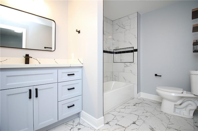 full bathroom with vanity, tiled shower / bath combo, and toilet