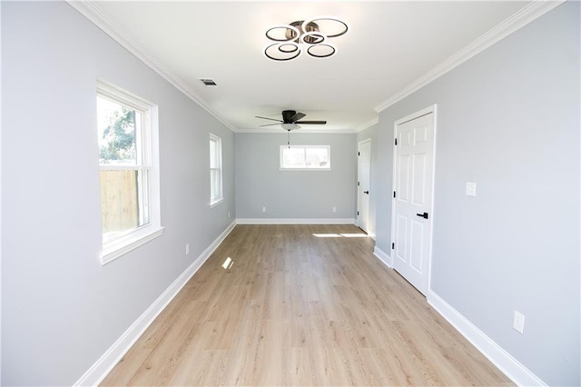 unfurnished room featuring crown molding, ceiling fan, and light wood-type flooring