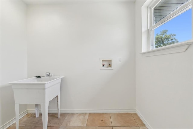 laundry room with light tile patterned floors and washer hookup