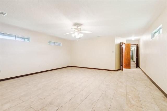 unfurnished room featuring ceiling fan