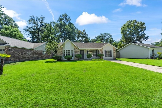 single story home with a front yard