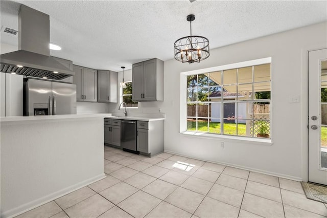 kitchen featuring appliances with stainless steel finishes, ventilation hood, an inviting chandelier, gray cabinets, and light tile patterned flooring