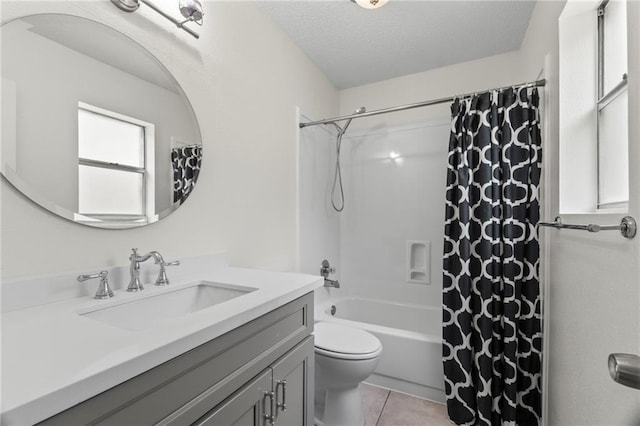 full bathroom with tile patterned flooring, a textured ceiling, toilet, shower / tub combo with curtain, and vanity