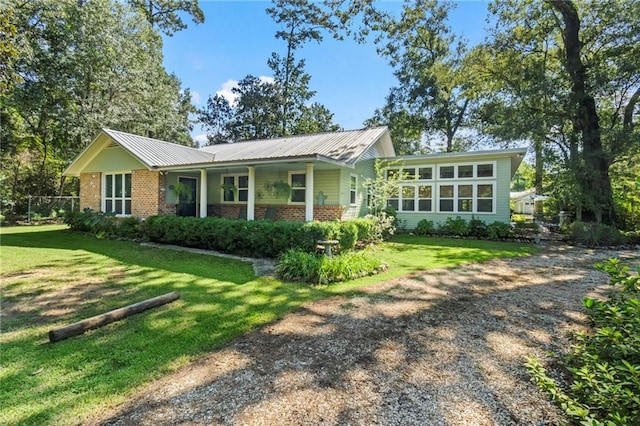 ranch-style house with a front lawn