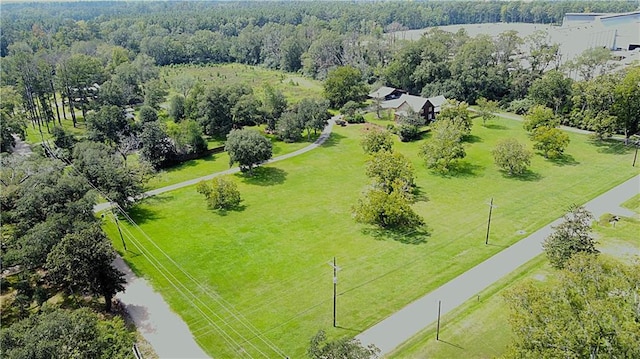 drone / aerial view with a forest view and a rural view