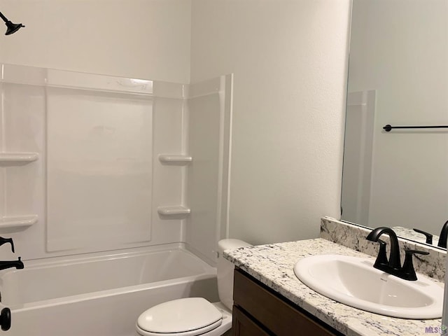 full bathroom featuring vanity,  shower combination, and toilet