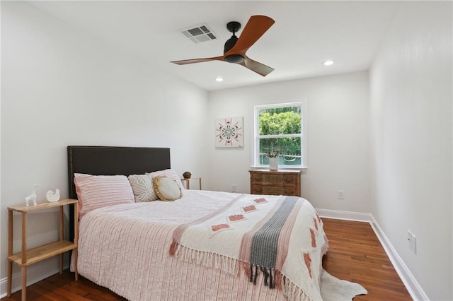 bedroom featuring dark wood-type flooring and ceiling fan