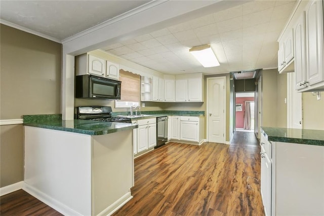 kitchen featuring black appliances, dark hardwood / wood-style flooring, kitchen peninsula, and white cabinetry