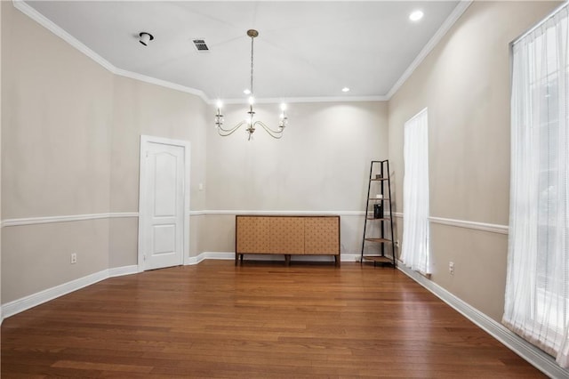 unfurnished room featuring visible vents, a chandelier, crown molding, recessed lighting, and wood finished floors
