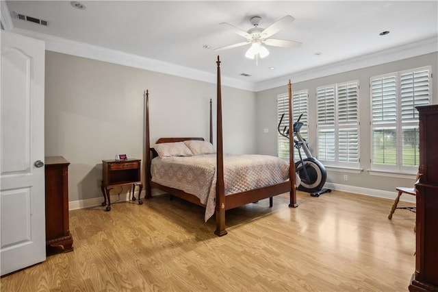 bedroom featuring crown molding, ceiling fan, and light hardwood / wood-style floors