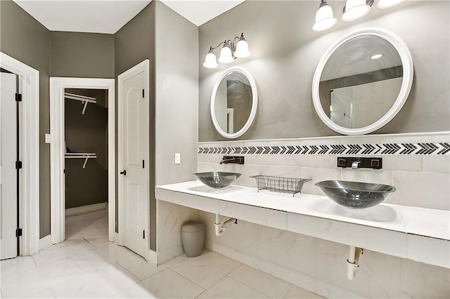 bathroom with vanity and backsplash