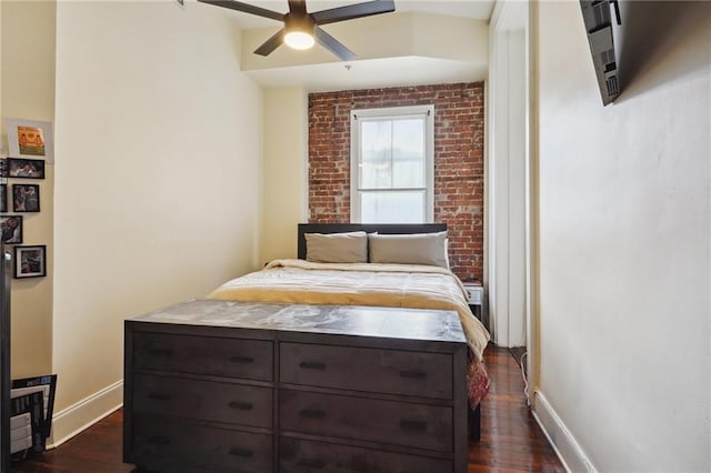 bedroom with dark wood-type flooring and ceiling fan