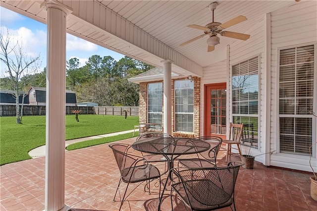 view of patio featuring ceiling fan