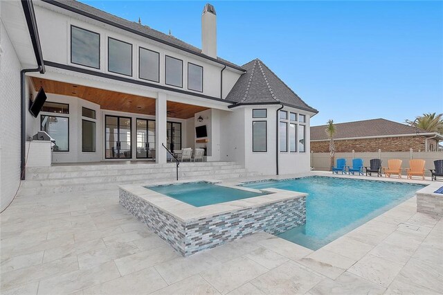 view of swimming pool featuring a patio area