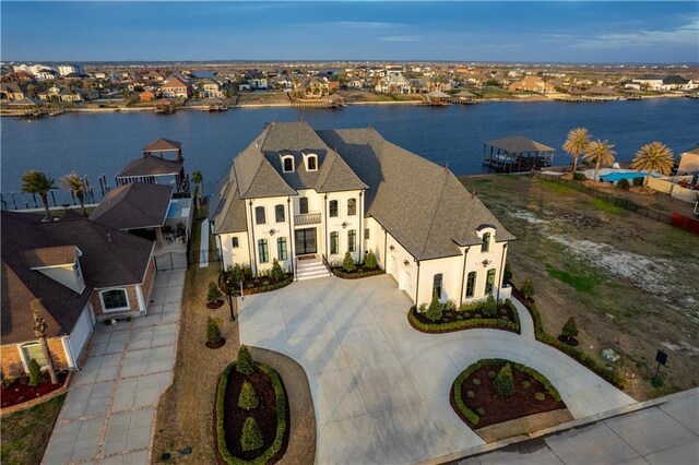 drone / aerial view with a water view