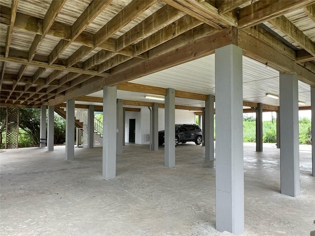 exterior space with a carport