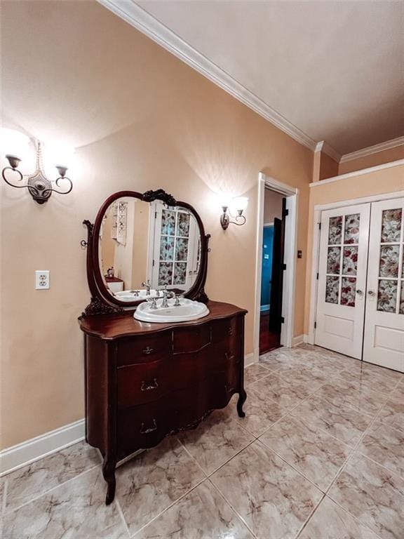 hall featuring sink, crown molding, and french doors