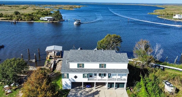 bird's eye view with a water view