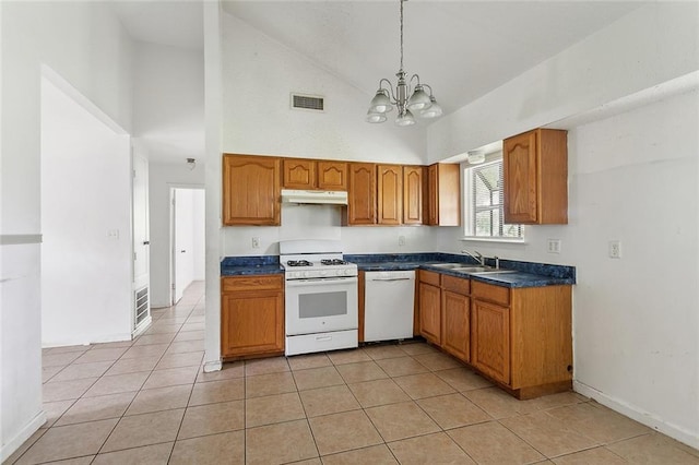 kitchen with white appliances, a notable chandelier, sink, high vaulted ceiling, and pendant lighting