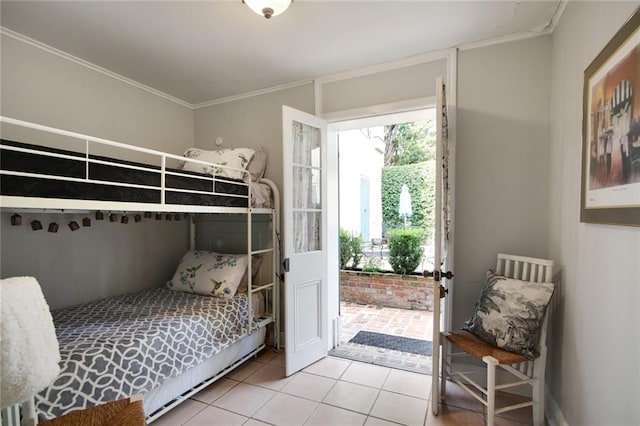 tiled bedroom with access to exterior and crown molding