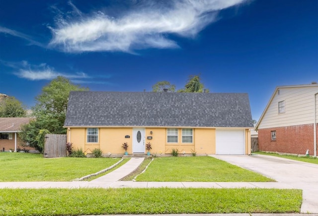 ranch-style house with a front lawn and a garage