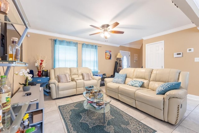 living room featuring ceiling fan, crown molding, and light tile patterned floors