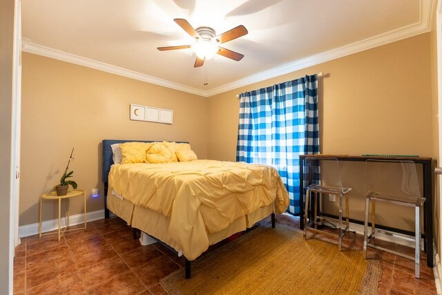 tiled bedroom featuring ceiling fan and crown molding