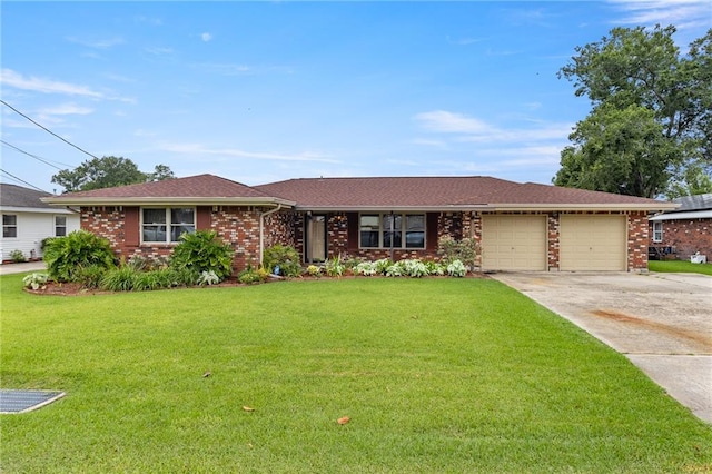 ranch-style home featuring a garage and a front yard