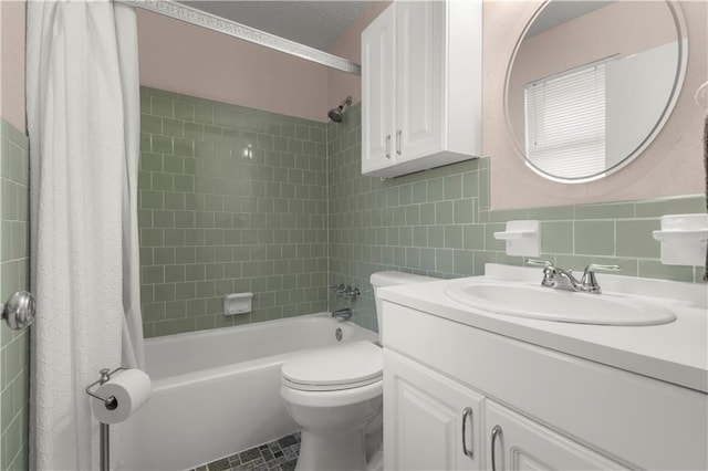 full bathroom with vanity, shower / tub combo with curtain, backsplash, tile walls, and toilet