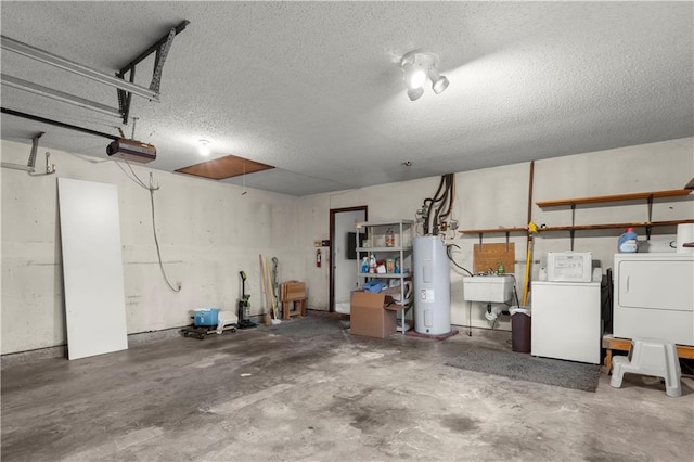 garage with washing machine and clothes dryer, sink, a garage door opener, and water heater