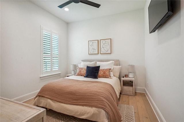 bedroom featuring ceiling fan and light wood-type flooring