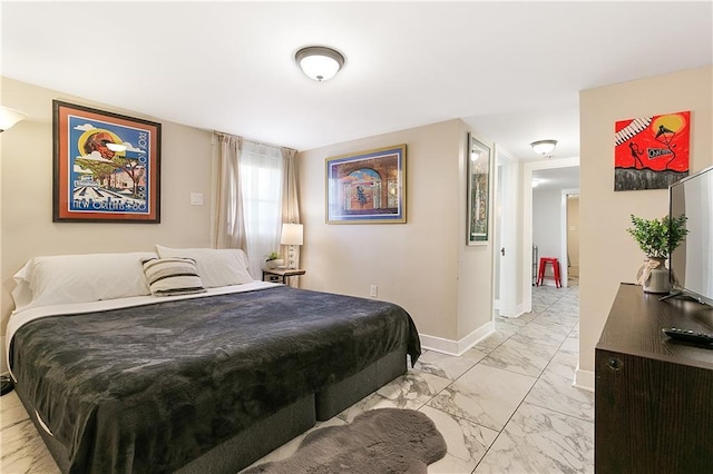 119 Elmeer Ave, Metairie, LA 70005 - bedroom with light marble finish flooring and baseboards