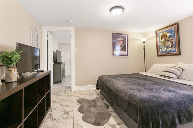 119 Elmeer Ave, Metairie, LA 70005 - bedroom with light marble finish flooring