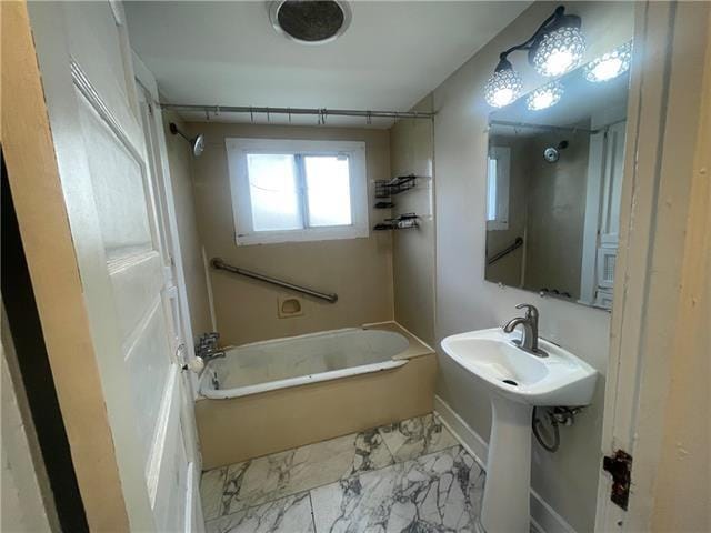 bathroom featuring washtub / shower combination