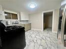 119 Elmeer Ave, Metairie, LA 70005 - kitchen with baseboards and stainless steel microwave