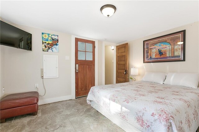 119 Elmeer Ave, Metairie, LA 70005 - bedroom featuring baseboards and electric panel