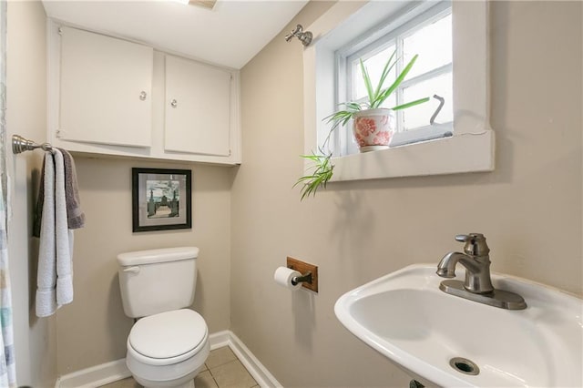119 Elmeer Ave, Metairie, LA 70005 - half bathroom with a sink and tile patterned floors