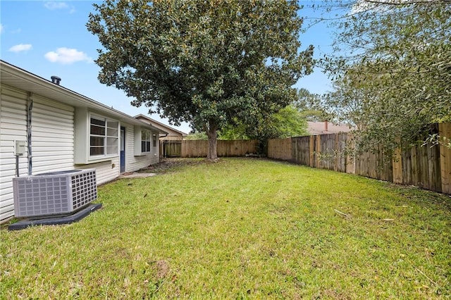 view of yard with central AC unit