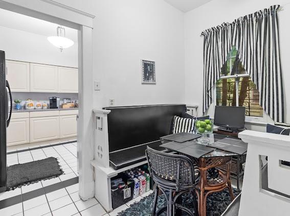 interior space with light tile patterned floors