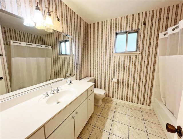 full bathroom featuring vanity, toilet, tile patterned flooring, and shower / bathtub combination with curtain