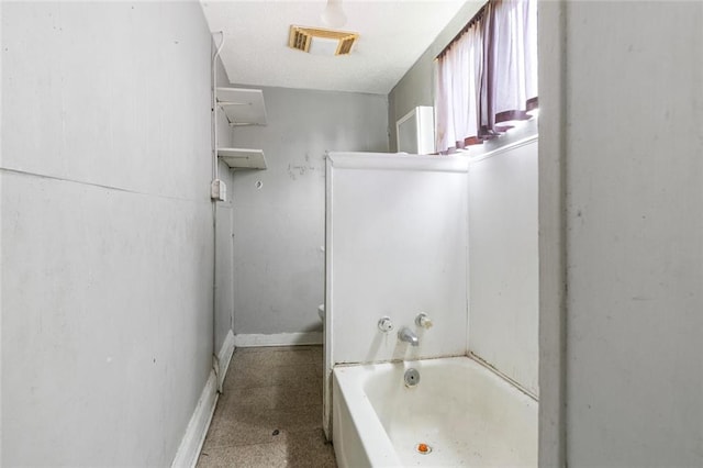 bathroom with bathing tub / shower combination